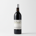 Red wine bottle with 'Ridge Monte Bello' label on a black background