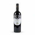 Wine bottle with decorative Bu Onice label on a white background