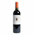 Red wine bottle with a Chateau Forcas Hosten label on a white background
