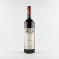 Bottle of Grosjean Pinot Noir wine on a green background