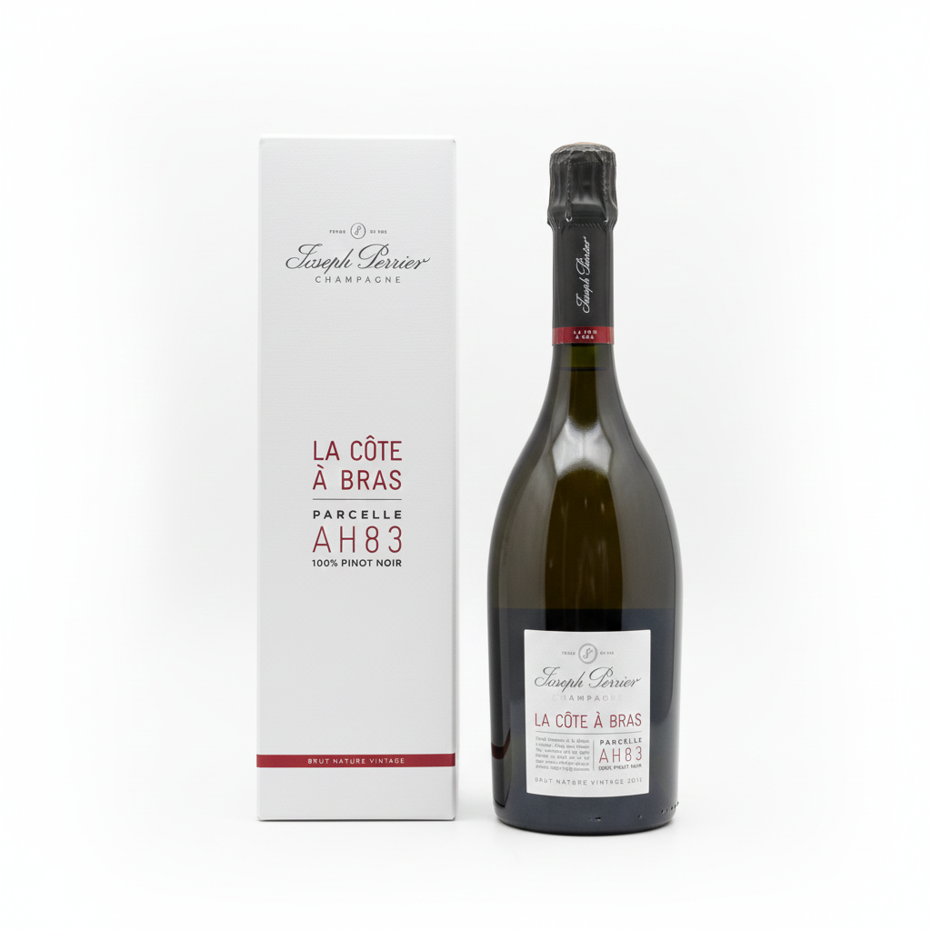 Bottle of Joseph Perrier La Côte à Bras Champagne with packaging on a white background