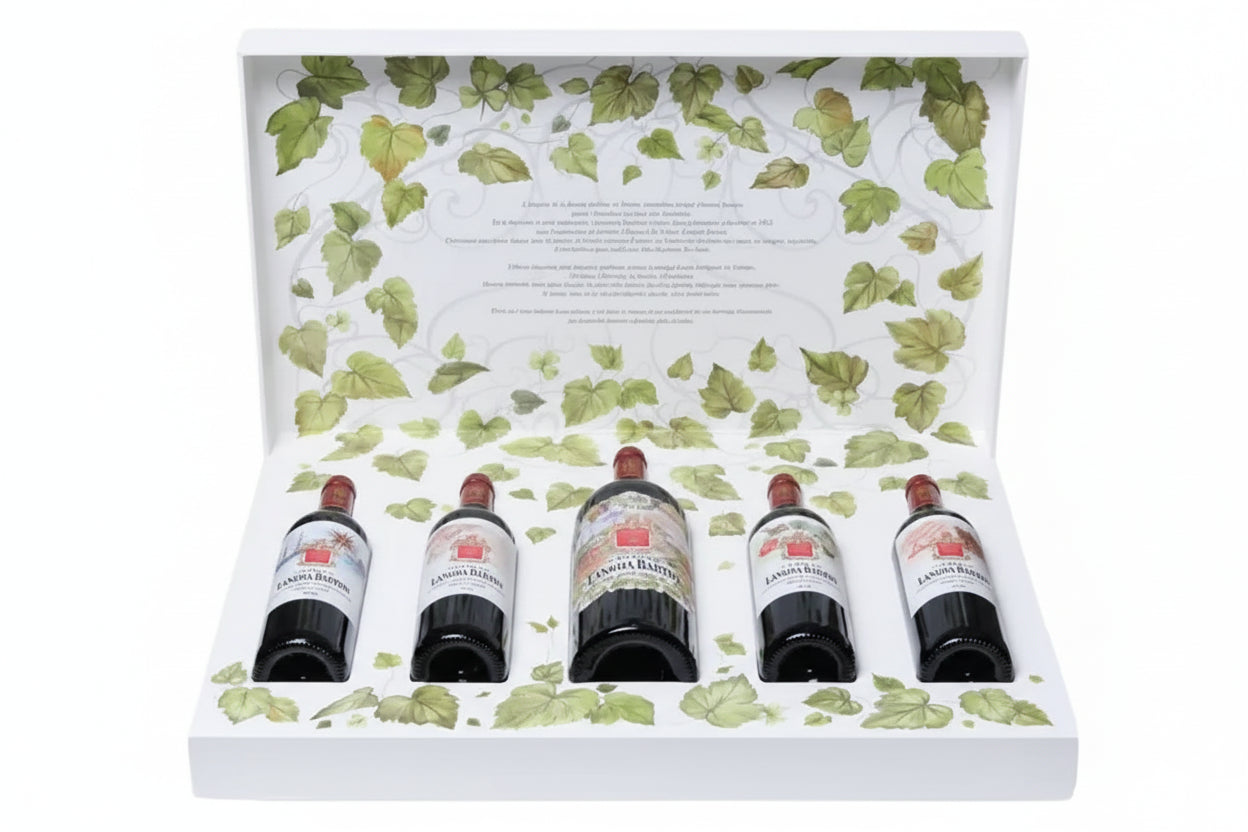 Set of five wine bottles in a decorative box with leaf pattern