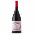 Wine bottle with a red cap and floral Lar de Paula Crianza label on a white background