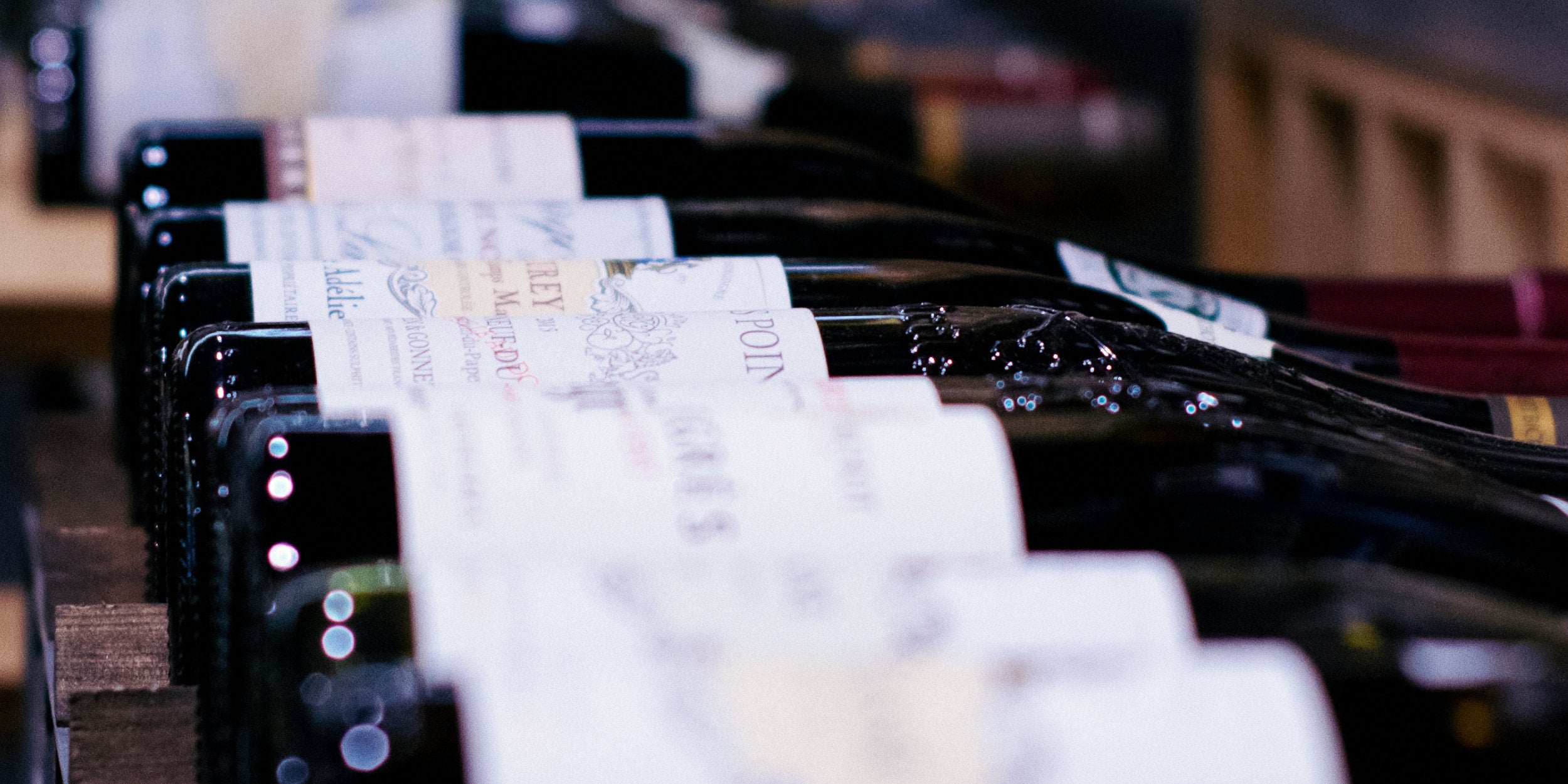 High end wine bottles laying on their side
