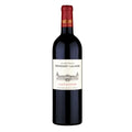 Red wine bottle with a Chateau Tronqouy Lalande label on a white background